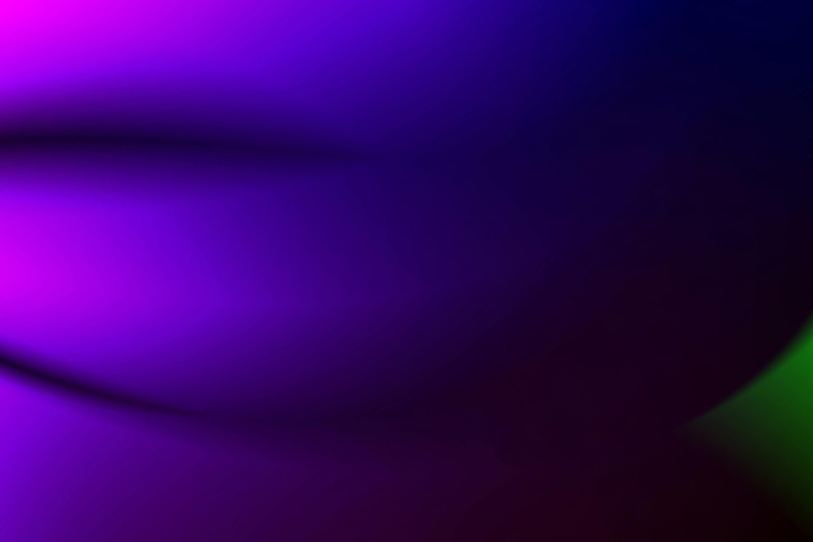 Colorful abstract gradient with purple and green hues creating a dynamic background.